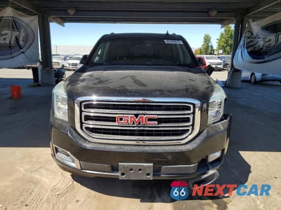 Piąte zdjęcie samochodu w środku: 2019 GMC YUKON SLT VIN:1GKS2BKC8KR164041 - miniatura