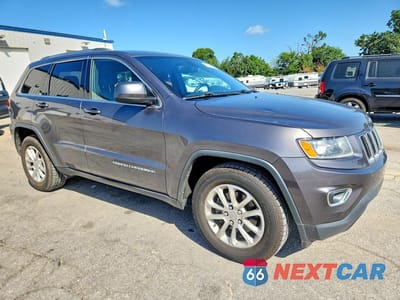 Czwarte zdjęcie samochodu z boku: 2015 JEEP GRAND CHEROKEE LAREDO VIN:1C4RJEAG6FC681026 - miniatura