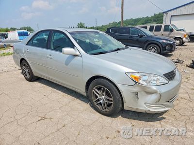 Czwarte zdjęcie samochodu z boku: 2002 TOYOTA CAMRY XLE V6 VIN:4T1BF30K52U506554 - miniatura