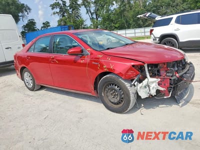 Czwarte zdjęcie samochodu z boku: 2014 TOYOTA CAMRY HYBRID LE VIN:4T1BD1FK2EU105775 - miniatura