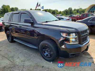 Czwarte zdjęcie samochodu z boku: 2018 CHEVROLET TAHOE POLICE VIN:1GNSKDEC7JR259604 - miniatura