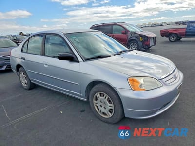Czwarte zdjęcie samochodu z boku: 2002 HONDA CIVIC LX VIN:2HGES16502H607184 - miniatura