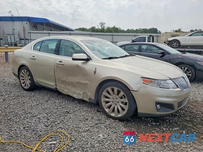 Czwarte zdjęcie samochodu z boku: 2010 LINCOLN MKS VIN:1LNHL9DR4AG611757 - miniatura