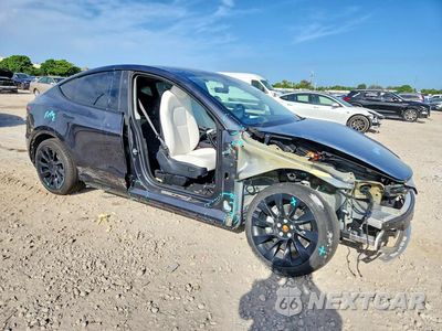 Czwarte zdjęcie samochodu z boku: 2024 TESLA MODEL Y VIN:7SAYGDED1RF009051 - miniatura
