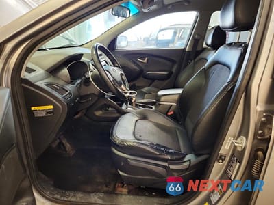Zdjęcie 7 z 13 samochodu: 2011 HYUNDAI TUCSON GLS VIN:KM8JU3AC0BU293022 - miniatura