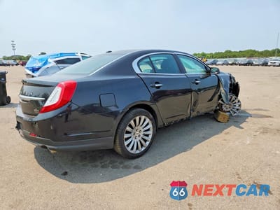 Trzecie zdjęcie samochodu z tyłu: 2015 LINCOLN MKS VIN:1LNHL9EKXFG607088 - miniatura