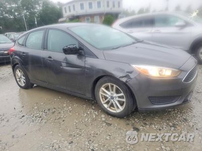 Czwarte zdjęcie samochodu z boku: 2018 FORD FOCUS SE VIN:1FADP3K28JL307094 - miniatura