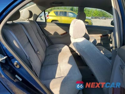Zdjęcie 10 z 12 samochodu: 2003 TOYOTA COROLLA LE VIN:JTDBR32EX30044861 - miniatura