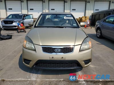 Piąte zdjęcie samochodu w środku: 2011 KIA RIO LX VIN:KNADH4A39B6734143 - miniatura