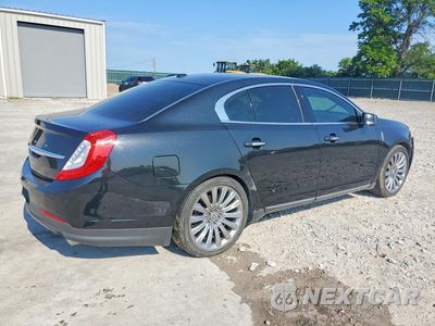 Trzecie zdjęcie samochodu z tyłu: 2015 LINCOLN MKS VIN:1LNHL9DK9FG608802 - miniatura