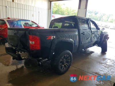 Trzecie zdjęcie samochodu z tyłu: 2010 CHEVROLET SILVERADO K1500 LT VIN:3GCRKSE32AG230314 - miniatura