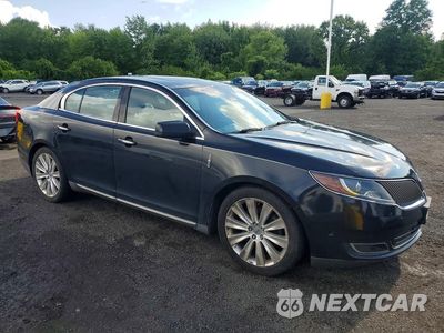 Czwarte zdjęcie samochodu z boku: 2014 LINCOLN MKS VIN:1LNHL9FT3EG600067 - miniatura