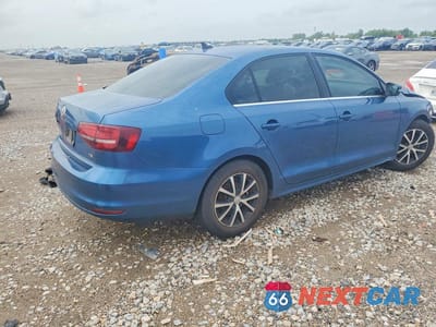 Trzecie zdjęcie samochodu z tyłu: 2018 VOLKSWAGEN JETTA SE VIN:3VWDB7AJ0JM259319 - miniatura