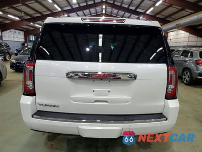 Zdjęcie 6 z 13 samochodu: 2016 GMC YUKON XL DENALI VIN:1GKS2HKJ6GR253860 - miniatura