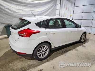 Trzecie zdjęcie samochodu z tyłu: 2017 FORD FOCUS SE VIN:1FADP3K25HL248158 - miniatura