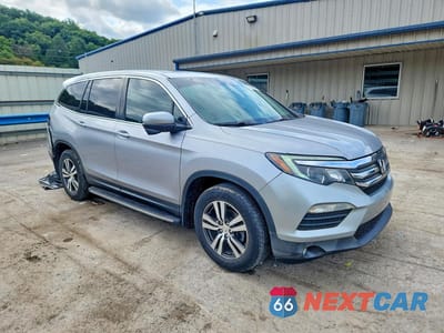 Czwarte zdjęcie samochodu z boku: 2017 HONDA PILOT EXL VIN:5FNYF5H50HB008028 - miniatura