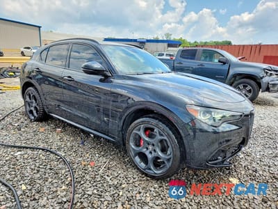 Czwarte zdjęcie samochodu z boku: 2024 ALFA ROMEO STELVIO TI VIN:ZASPAKBN6R7D70428 - miniatura