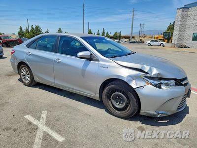 Czwarte zdjęcie samochodu z boku: 2015 TOYOTA CAMRY HYBRID LE VIN:4T1BD1FK3FU159278 - miniatura