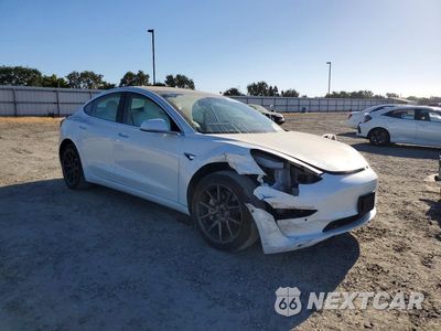 Czwarte zdjęcie samochodu z boku: 2020 TESLA MODEL 3 VIN:5YJ3E1EAXLF599095 - miniatura