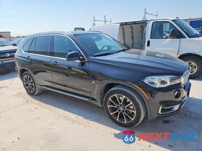 Czwarte zdjęcie samochodu z boku: 2018 BMW X5 XDR40E VIN:5UXKT0C55J0V99470 - miniatura