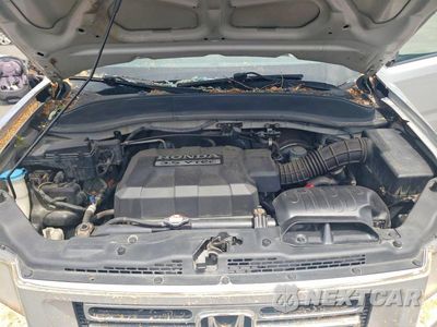Zdjęcie 11 z 13 samochodu: 2006 HONDA RIDGELINE RTS VIN:2HJYK16466H529336 - miniatura