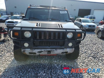 Piąte zdjęcie samochodu w środku: 2004 HUMMER H2 VIN:5GRGN23U44H118018 - miniatura