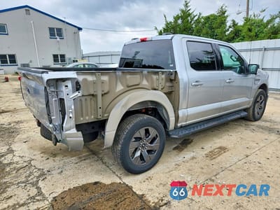 Trzecie zdjęcie samochodu z tyłu: 2023 FORD F150 LIGHTNING PRO VIN:1FTVW1EV1PWG50400 - miniatura