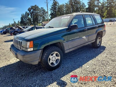 1997 JEEP GRAND CHEROKEE LAREDO 1J4GZ58S6VC727280 - główne zdjęcie licytacji z USA - miniatura