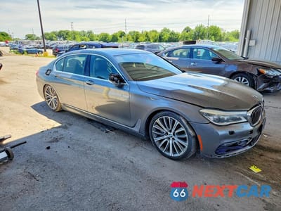 Czwarte zdjęcie samochodu z boku: 2016 BMW 750 XI VIN:WBA7F2C57GGE12322 - miniatura