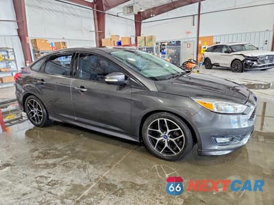 Czwarte zdjęcie samochodu z boku: 2015 FORD FOCUS SE VIN:1FADP3F28FL373047 - miniatura