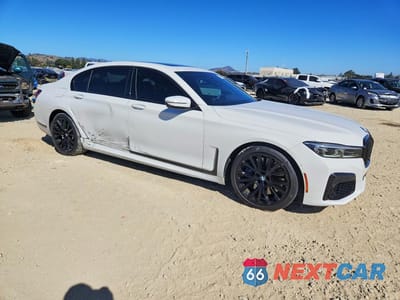 Czwarte zdjęcie samochodu z boku: 2022 BMW 740 I VIN:WBA7T2C0XNCJ48253 - miniatura