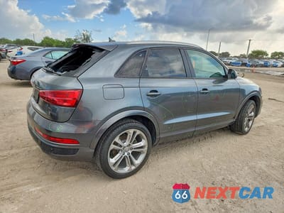 Trzecie zdjęcie samochodu z tyłu: 2018 AUDI Q3 PREMIUM VIN:WA1BCCFS0JR030987 - miniatura