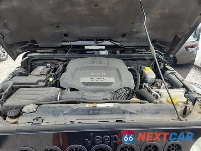 Zdjęcie 11 z 12 samochodu: 2012 JEEP WRANGLER SAHARA VIN:1C4AJWBG7CL264706 - miniatura