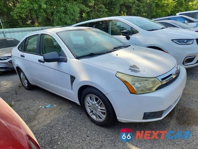 Czwarte zdjęcie samochodu z boku: 2008 FORD FOCUS SE VIN:1FAHP35N28W182643 - miniatura