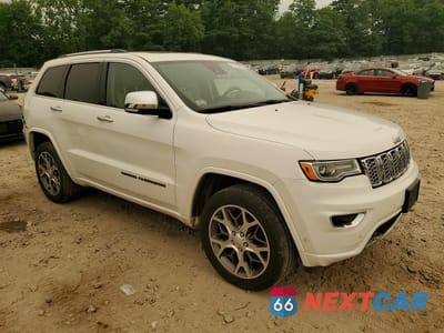 Czwarte zdjęcie samochodu z boku: 2021 JEEP GRAND CHEROKEE OVERLAND VIN:1C4RJFCG9MC551757 - miniatura