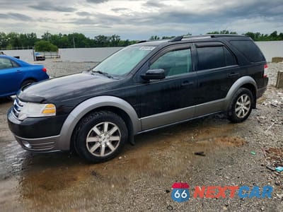 2009 FORD TAURUS X SEL 1FMDK02W79GA02454 - główne zdjęcie licytacji z USA - miniatura
