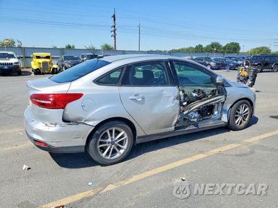 Trzecie zdjęcie samochodu z tyłu: 2016 FORD FOCUS SE VIN:1FADP3F22GL365947 - miniatura