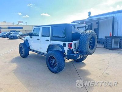 Trzecie zdjęcie samochodu z tyłu: 2015 JEEP WRANGLER UNLIMITED RUBICON VIN:1C4BJWFG3FL530855 - miniatura