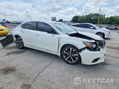 Czwarte zdjęcie samochodu z boku: 2016 NISSAN ALTIMA 2.5 SR VIN:1N4AL3AP2GC171971 - miniatura