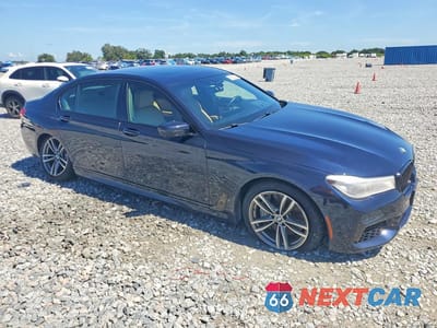 Czwarte zdjęcie samochodu z boku: 2018 BMW 750 XI VIN:WBA7F2C59JB238674 - miniatura