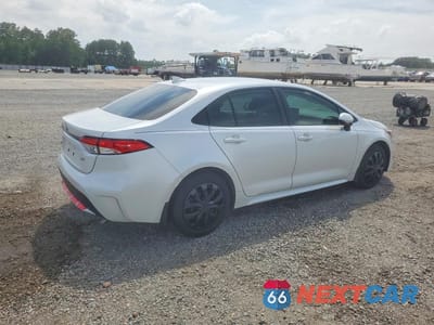 Trzecie zdjęcie samochodu z tyłu: 2022 TOYOTA COROLLA LE VIN:JTDEPMAE8N3016259 - miniatura