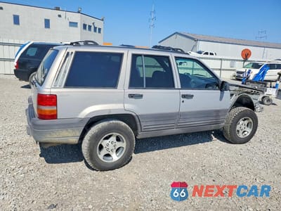 Trzecie zdjęcie samochodu z tyłu: 1996 JEEP GRAND CHEROKEE LAREDO VIN:1J4GZ58S2TC327133 - miniatura