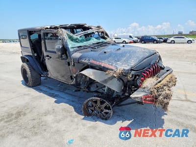 Czwarte zdjęcie samochodu z boku: 2014 JEEP WRANGLER UNLIMITED SAHARA VIN:1C4BJWEG5EL197848 - miniatura