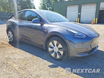 Czwarte zdjęcie samochodu z boku: 2023 TESLA MODEL Y VIN:7SAYGDEEXPF607774 - miniatura