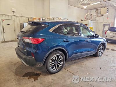 Trzecie zdjęcie samochodu z tyłu: 2020 FORD ESCAPE SEL VIN:1FMCU9H65LUB04054 - miniatura