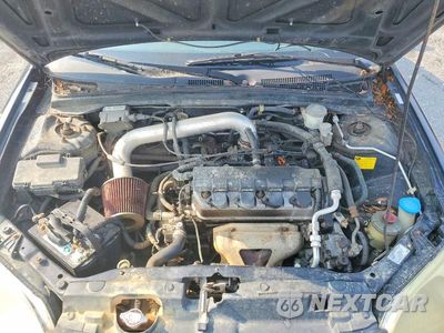 Zdjęcie 11 z 12 samochodu: 2003 HONDA CIVIC LX VIN:1HGEM21563L048882 - miniatura