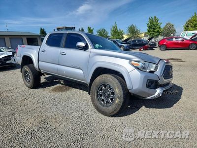 Czwarte zdjęcie samochodu z boku: 2019 TOYOTA TACOMA TRD SPORT VIN:3TMCZ5ANXKM190013 - miniatura