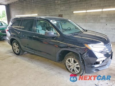 Czwarte zdjęcie samochodu z boku: 2018 HONDA PILOT LX VIN:5FNYF6H19JB015780 - miniatura