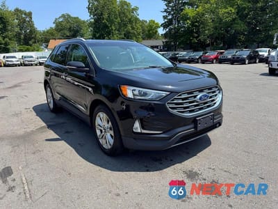 Czwarte zdjęcie samochodu z boku: 2020 FORD EDGE TITANIUM VIN:2FMPK4K93LBA60784 - miniatura