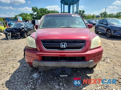 Piąte zdjęcie samochodu w środku: 2005 HONDA PILOT EXL VIN:5FNYF18535B059902 - miniatura